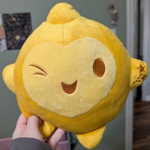 Adorable Yellow Plush Toy with Winking Face